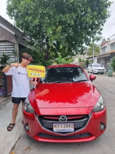 ทีมงานเข้าตรวจสภาพและทำสัญญารับซื้อ Mazda 2 เครื่องยนต์ดีเซล (Clean Diesel) มือเดียวป้ายแดง ตีราคาตรงไปตรงมา