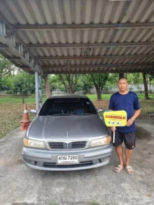ภาพผลงานรับซื้อรถเก่า Nissan Cefiro โฉม A33 ลูกค้ายืนยันความประทับใจด้วยป้ายรีวิว CAR2GOLD